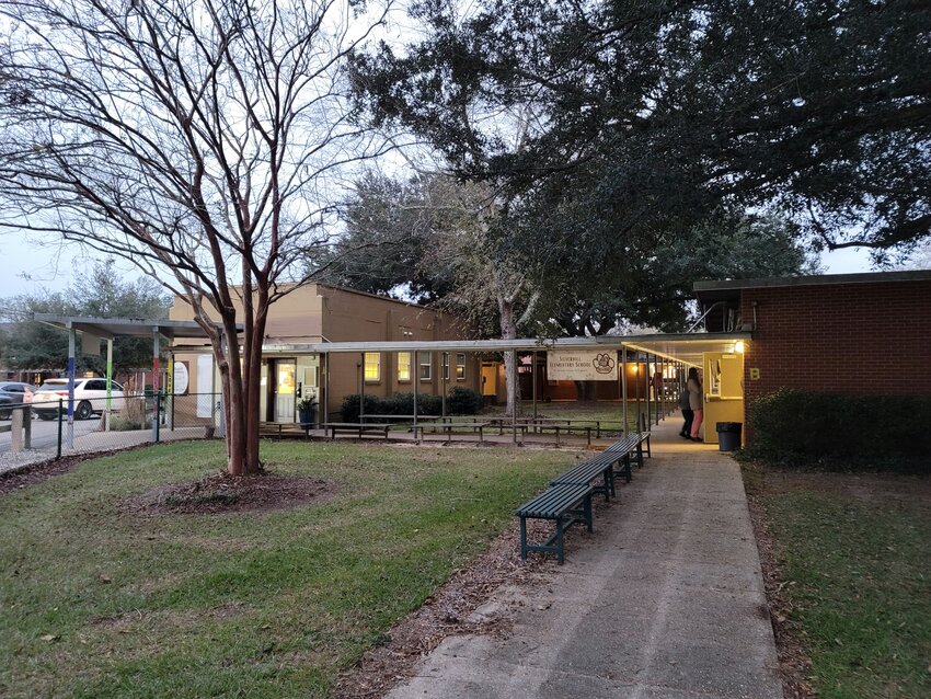 It was cold and dreary on Dec. 5 as former and current students, faculty and community members walked the grounds of Silverhill Elementary School, some for the last time before the school's eventual demolition.