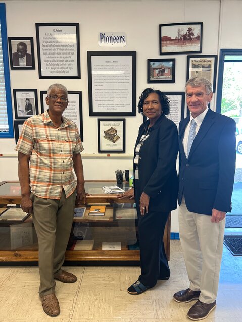 Left to right, Rev. D.L. Boykin, Ethel Higgins and Sam Crosby with the Stephen Boykin tribute display at the Douglasville School Museum in Bay Minette. Photo provided.