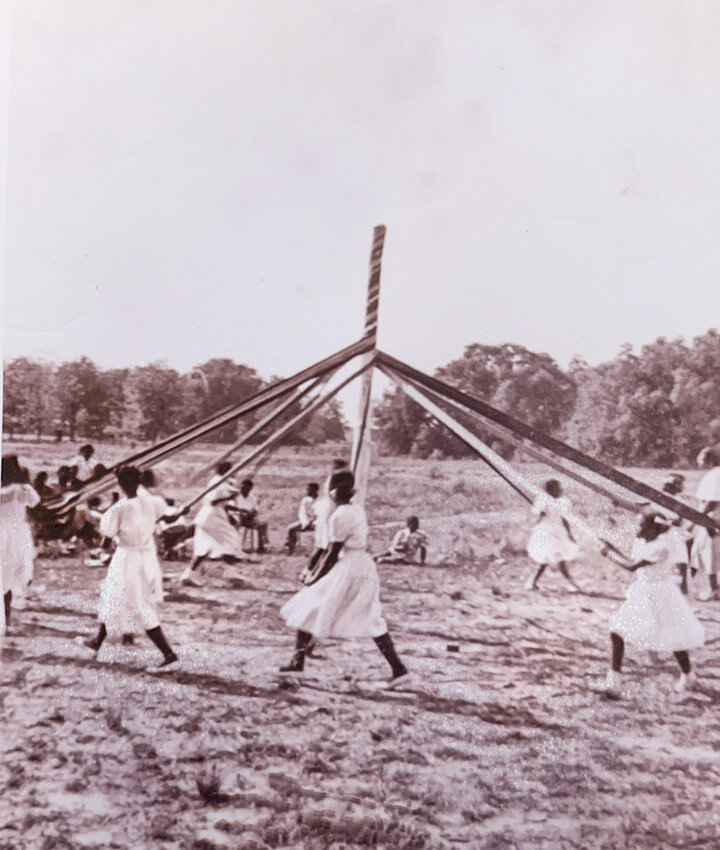 Winding the Maypole was the highlight of the spring festival at Anna T. Jeannes School.