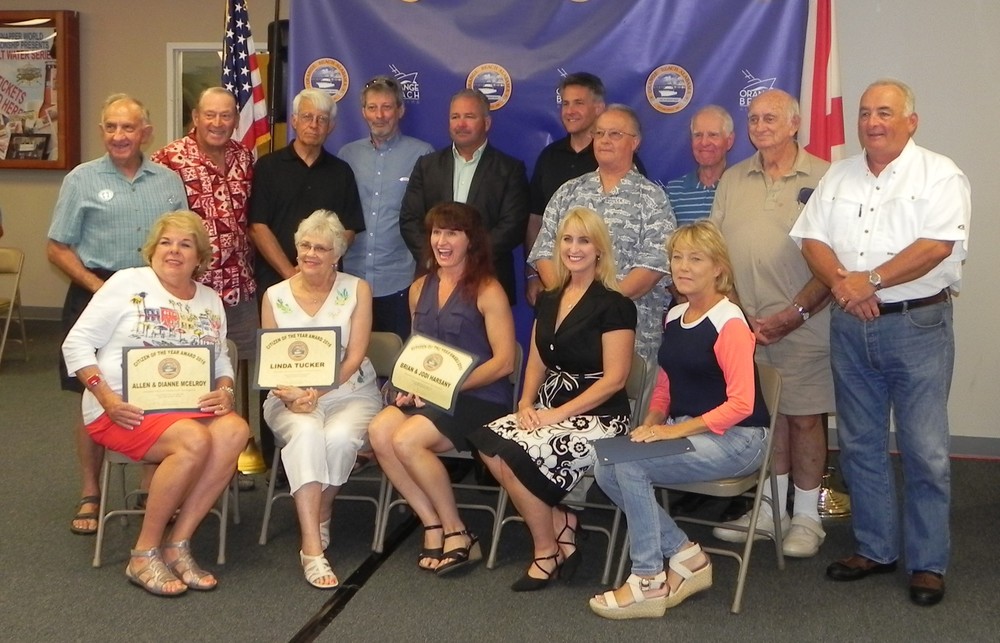 Seated, from left, are Dianne McElroy, Linda Tucker, Jodi Harsany, Jeanna Bulman and Jane Rodgers, all Citizen of the Year recipients. Standing from left are Allen McElroy, Ron David, John Davis, Ken Cooper, Mayor Tony Kennon, Brian Harsany, Ralph Moore, Peter Rabideau, Mike O&rsquo;Rouke and Lee Rodgers. All were Citizen of the Year recipients except for Rabideau who was given a Mayor&rsquo;s Distinguished Service Award. Not shown is 100-year-old Haddox &ldquo;Sunny&rdquo; Autrey who received a Mayor&rsquo;s Distinguished Award as well.
