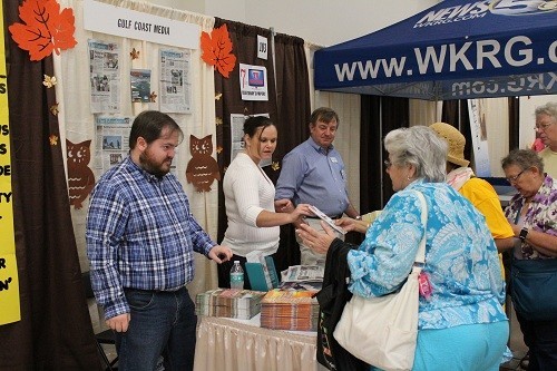 Gulf Coast Media staff man the booth at the Baldwin County Senior Expo on Oct. 6.