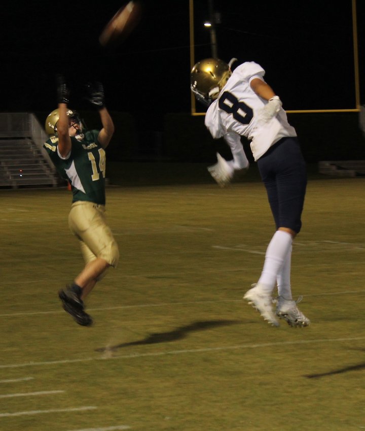Sophomore Corbin Hall goes up for a pass for Snook Christian Academy Friday night at John T. Cobb Stadium in Elberta.