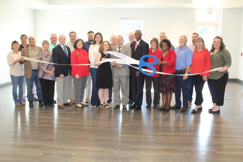 Local, county and state officials, along with engineering and construction officials, cut the ribbon to dedicate the new Robertsdale Public Works facility on East Chicago Street.