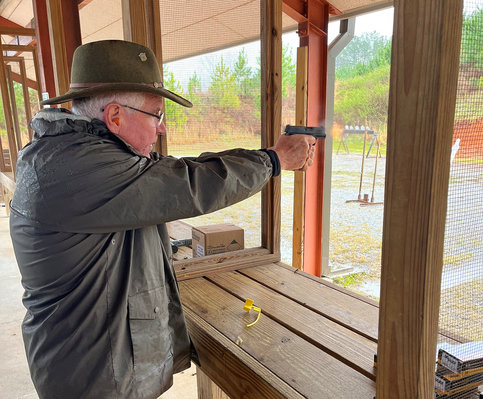 Dick Jones fires a Sig Sauer P365 at the CMP Talladega Marksmanship Park.