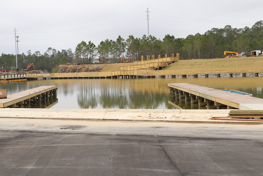 The official opening of the county boat launch at the Intracoastal Waterway has been postponed while officials and engineers work to correct design flaws found in the facility.