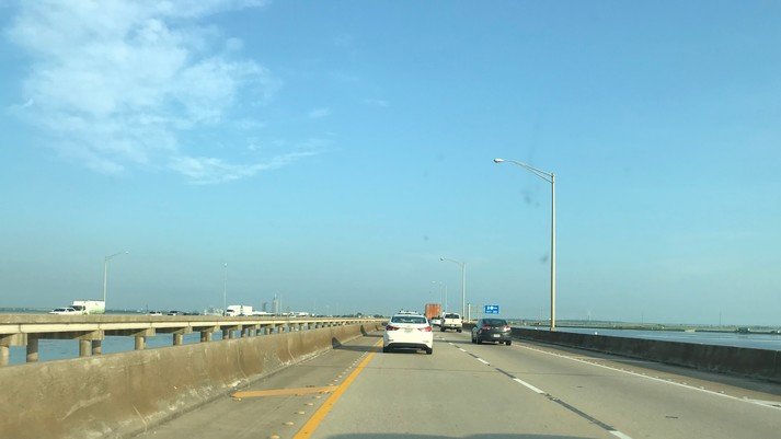 Traffic moves across the Interstate 10 Bayway. State officials plan to apply for federal infrastructure funding to help pay the cost of a new route across the Mobile River and Mobile Bay.