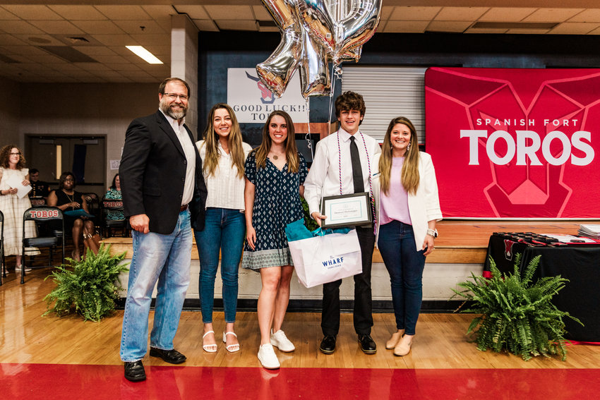 Pictured here, from left: Jason Clabo, The Wharf general manager; Anna Danish, The Wharf social media manager; Gabrielle Napier, The Wharf sponsorship director; Denver Persinger, Scholarship recipient; and JamieDay Montgomery, The Wharf PR + content manager.