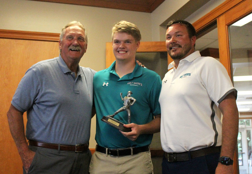Gulf Shores&rsquo; Case Hager was named the Midtown Optimist Club Baldwin County Pitcher of the Year. He was presented the trophy by guest speaker and Mobile Sports Hall of Famer Randy McGilberry at the Azalea City Golf Club May 25. He was joined by Dolphin Head Coach Chris Jacks.