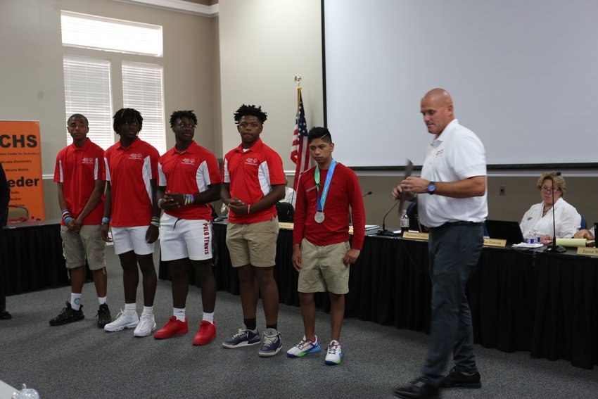 Baldwin County Schools&rsquo; Unified Flag Football team, the Baldwin Bandits, claimed silver medals at the USA Games in Orlando earlier this month. Coach Shawn O'Connor and team captains joined the team in being honored at the June 23 meeting of the Baldwin County Board of Education.