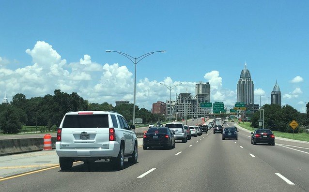 Traffic backs up on Interstate 10 in Mobile approaching the Wallace Tunnel and Bayway. The highway system across Mobile Bay was built to carry 36,000 vehicles a day. The total can exceed 100,000 on peak days, according to officials.