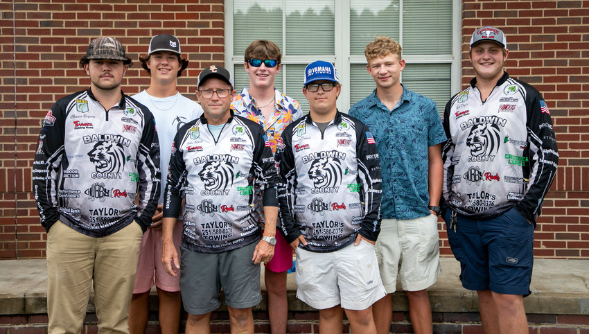 Members of the Baldwin County High School fishing team convened at the school Aug. 26 to discuss their fourth consecutive trip to the Bassmaster High School National Championships in South Carolina last month. Pictured from the left in the front row are Chance Bryars, head coach John Black and Hunter Travis. In the back row are Brody Lineberry, Jameson Norris, Conner Lanham and Jed Defee. Not pictured are Noah Bryars and Ryan Wright.