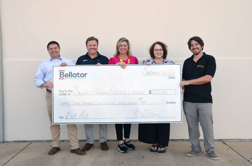 From left: Bellator chief operating officer Geoff Stacey, Bellator President Troy Wilson, Bellator Fairhope Office REALTOR&reg; Stephanie Sandefur, SBLC Youth Services &amp; Communications Supervisor Susan Bartholomew and SBLC Executive Director Mitchell Lee celebrated the campaign's success at Bellator's Spanish Fort Office on Sept. 12. Bellator raised $23,161 to support the SBLC's mission.