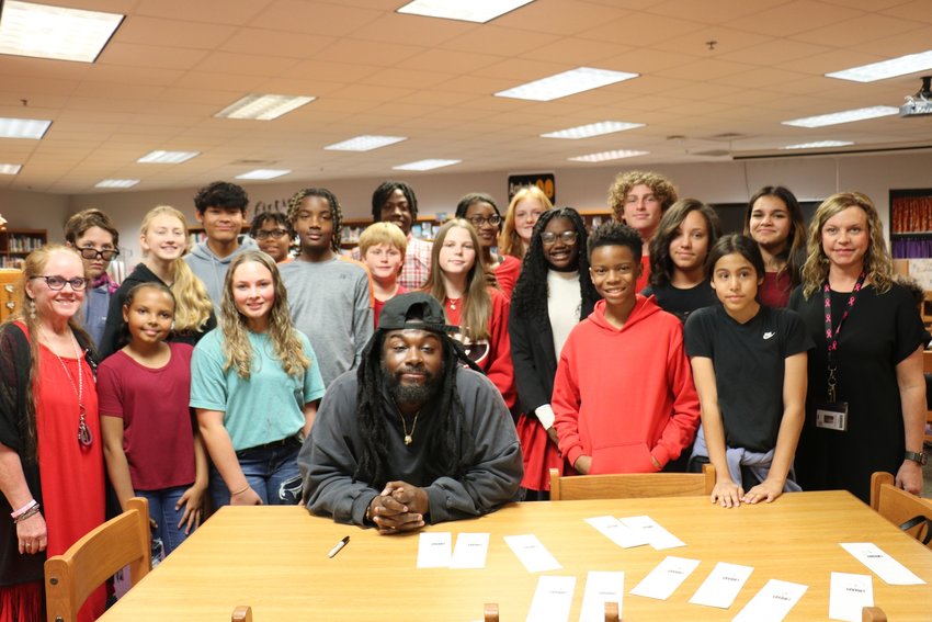 Bay Minette Middle School hosted author Jason Reynolds for a private event as part of the final leg of his &quot;Grab The Mic: Tell Your Story&quot; platform.