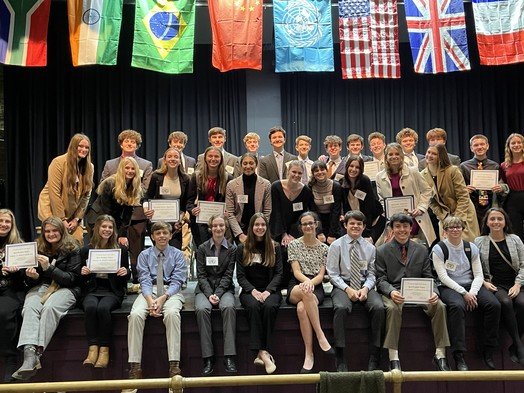 The St. Michael Catholic High School Model United Nations (UN) team competed in its first Arkansas Model UN Conference with prowess and poise, winning 19 awards, including the second highest award.