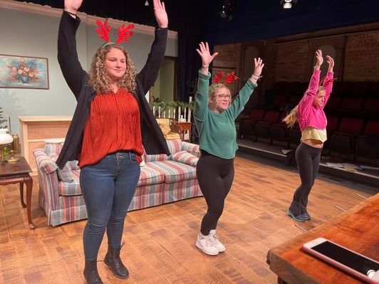 Cast members rehearse for Theatre 98's Holiday Cabaret, which opens in Fairhope tonight.