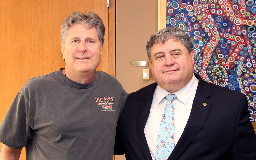 United States Sports Academy alum Mike Leach poses for a picture with Academy President and CEO Dr. TJ Rosandich during one of his visits to the Daphne campus. A 21-year college football coaching veteran, Leach passed away due to complications of a heart condition Monday night, Dec. 12, at the age of 61.