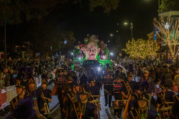 Crowds line Fairhope streets during the city's Mardi Gras parade in 2022. Fairhope city officials are studying recommendations for future Carnival activities that would include restricting or moving rental sites for recreational vehicles during the parade season.