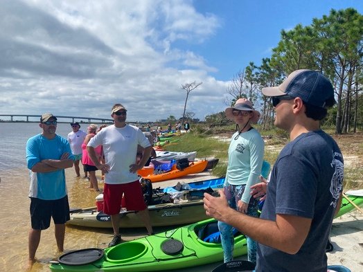 The Pensacola &amp; Perdido Bays Estuary Program leads a kayak trip through the Lower Perdido Island. The group regularly takes visitors out into the estuary to learn and love the natural resources there.