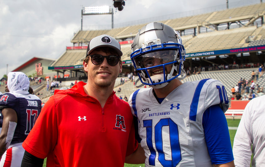 Orange Beach&rsquo;s Brandon Silvers and Mobile&rsquo;s AJ McCarron pose for a picture after Sunday&rsquo;s XFL game between the Houston Roughnecks and St. Louis Battlehawks at TDECU Stadium in Houston. The former quarterbacks for the Gulf Shores Dolphins and St. Paul&rsquo;s Saints, respectively, reunited on the field after spending the offseason at the same training facility.