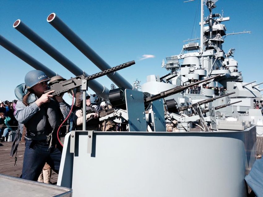 Interact with historical World War II reenactors aboard the USS Alabama and the USS Drum.