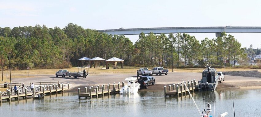 The Launch at ICW, a $10-million facility in Orange Beach, was dedicated Friday, Oct. 28. The launch site includes six boat ramps, parking for trailers, 1,700 of water frontage, hiking trails and bridges. The purchase of the land and construction costs were covered by GOMESA funds.