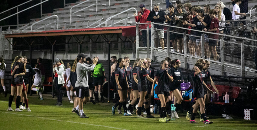 Spanish Fort head girls&rsquo; soccer coach Calum Kearney acknowledges the fans in the stands after the Toros&rsquo; 2-0 loss to Montgomery Academy in the AHSAA Class 6A state quarterfinal match Friday, May 5, at home.