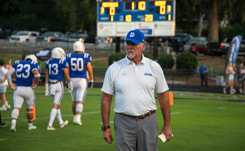 Phil Lazenby prepares for Bayside Academy&rsquo;s Class 4A Region 1 game against the St. Michael Catholic Cardinals on Sept. 2, 2022, at Freedom Field in Daphne. After he stepped down as the Admirals&rsquo; head coach in December, Lazenby was announced as the leader of Bayshore Christian&rsquo;s new program that is set to take the field in 2024.