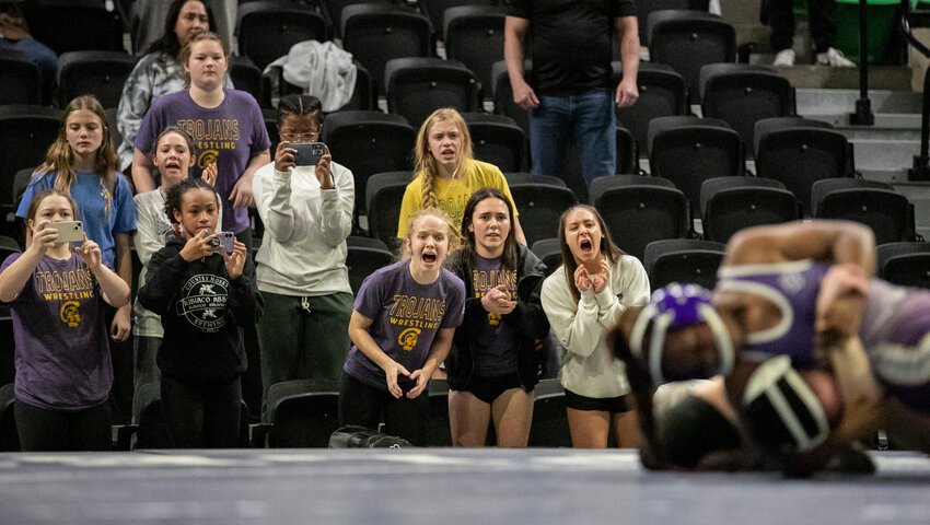 The Daphne Trojans cheer on Kalyse Hill during the 132-pound state championship match at Birmingham&rsquo;s Bill Harris Arena Jan. 20. For the first time in the 40-year history of the Alabama State Games, there will be a girls-only Folkstyle Tournament thanks to a partnership with the Alabama Girls Wrestling Alliance.