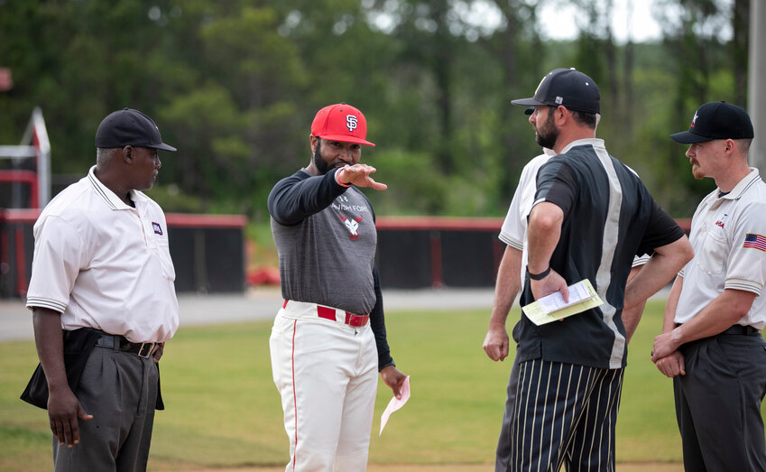 Spanish Fort head coach JD Pruitt discusses the ground rules ahead of the Toros&rsquo; first-round playoff game against the McAdory Yellow Jackets on April 21 at home. On Monday, Pruitt was announced as the newest head baseball coach at Coastal Alabama South in Bay Minette.