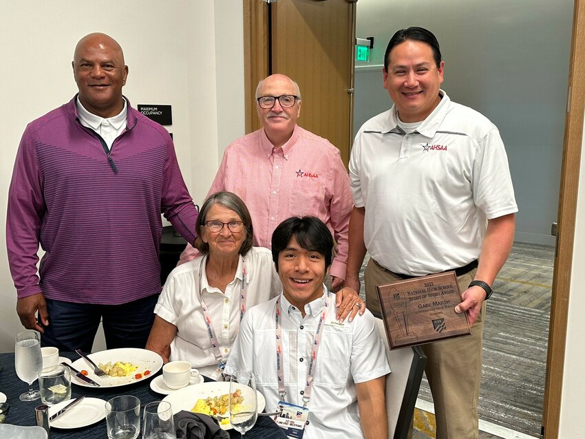 Gabe Marsh and his mother Ann with AHSAA Executive Director Alvin Briggs, Marvin Chou and Ron Ingram at Wednesday&rsquo;s Spirit of Sport/Heart of the Arts Breakfast at the NFHS Summer Meeting in Seattle. Marsh is a recent graduate of Guntersville High School who won state titles at the Alabama High School Athletic Association state championships and the Alabama Para Olympics.