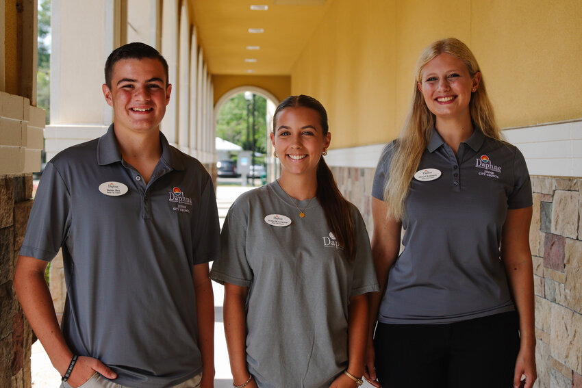 Members of the Daphne Junior City Council voted to elect three new officers. On July 19, after the votes were tallied, three Daphne High School students emerged as the elected officers. Sunny Blackwood (Middle) assumed the role of Chairperson; Gracie Robinson (Right) became the Vice Chairperson and Daniel Hill (Left) took on the role of Secretary.
