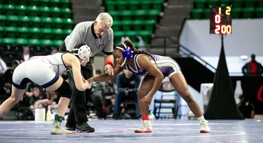 Daphne&rsquo;s Kalyse Hill shakes hands with Tuscaloosa County&rsquo;s Raya Carpenter before battling in the 132-pound championship match on Jan. 20 at Bill Harris Arena during the girls&rsquo; wrestling state finals. Starting in the 2024-25 season, girls&rsquo; wrestling will be the newest sanctioned sport by the Alabama High School Athletic Association following approval at Wednesday&rsquo;s Central Board of Control meeting.
