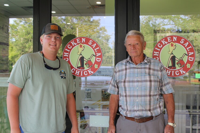Carter Antinarella (left) arrived around 4:30 a.m. to secure the No. 1 spot in line at the Chicken Salad  Chick Fairhope grand opening, and Joe Klumpp arrived around 5:15 a.m. to secure No. 2 in line.