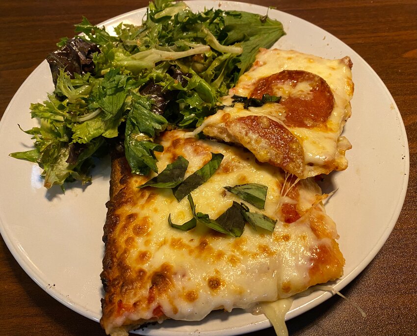 Two slices, one plain cheese and the other pepperoni with the mixed salad. The slices were topped with fresh basil when they came out of the oven before heading to our table