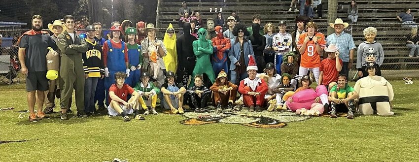 The Baldwin County Tigers gather for a picture after Thursday&rsquo;s annual Trunk or Treat event at Halliday Park in Bay Minette.