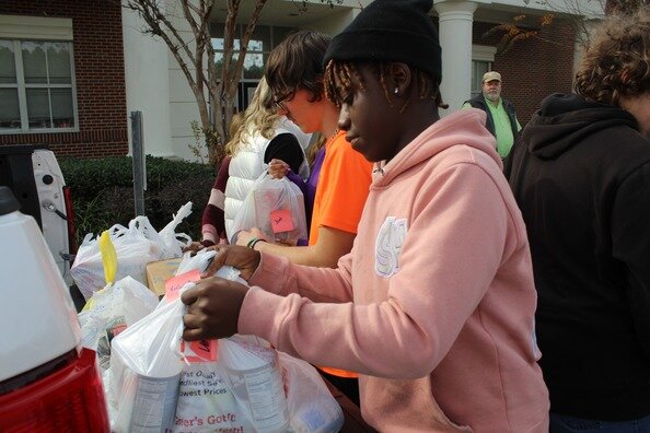Over 40 Baldwin County High School students are lending a hand this holiday season, helping to collect and sort food donations for the North Baldwin Ecumenical food pantry.