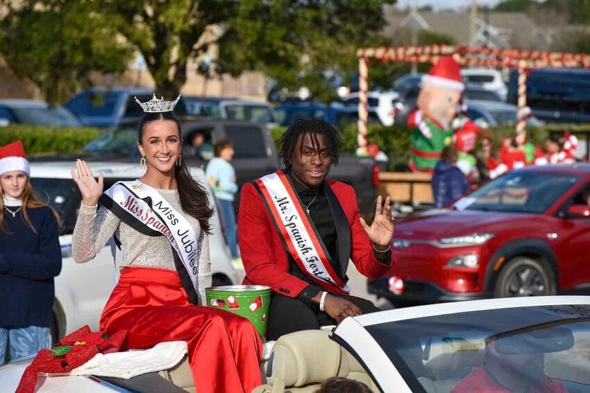 Megan Kent, Miss Eastern Shore Teen and Spanish Fort High School student, rides through town during the annual Spanish Fort Christmas parade on Dec. 10.