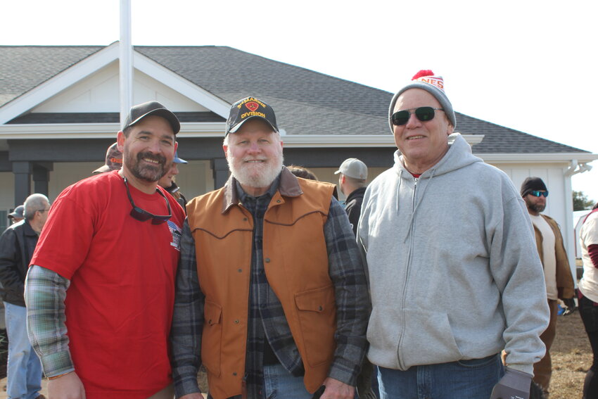 U.S. Marine Corps Staff Sgt. Johnny Morris II, Robert King and Jerry Cherne. King and Cherne are Marines and members of the Jesse Andrews Jr., Detachment, Marine Corps League in Daphne. They were among the volunteers Saturday.
