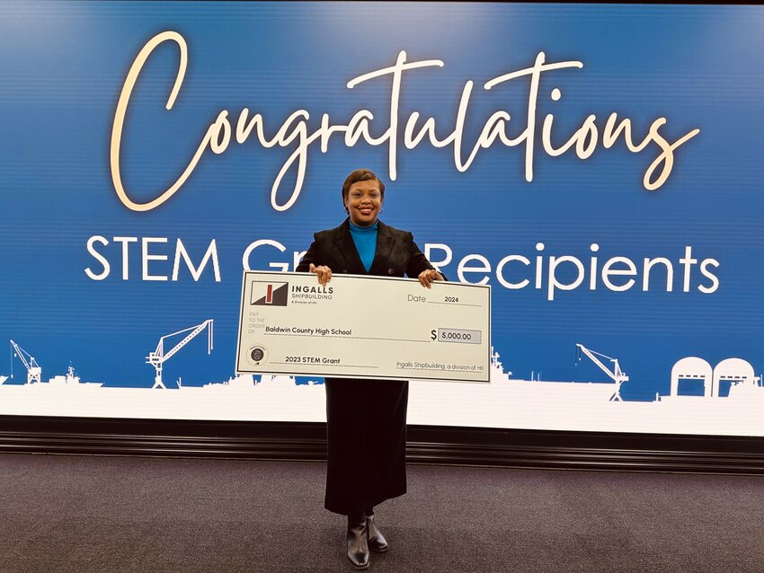 Chantelle McPherson, a teacher at Baldwin County High School in Bay Minette, recently attended a breakfast celebration and check presentation at Ingalls Shipbuilding in Pascagoula, Mississippi. The event was organized to honor recipients of the 2023-2024 Future Shipbuilder STEM Grant awards. McPherson was among the awardees, securing a $5,000 grant for her innovative project titled &quot;Project Anatomy in Clay.&quot;