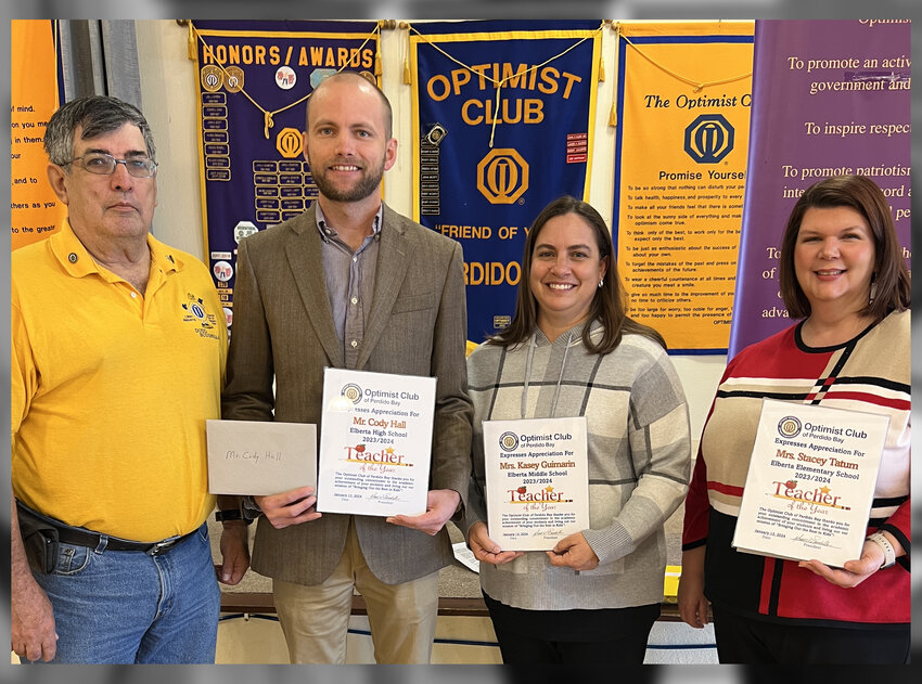 Teachers of the Year of Elberta Elementary, Middle and High Schools were recently honored by the Optimist Club of Perdido Bay. From left are Optimist President Dodd Bouchillon, Elberta High School teacher Cody Hall, Middle School teacher Kasey Guimarin and Elementary school teacher Stacey Tatum.
