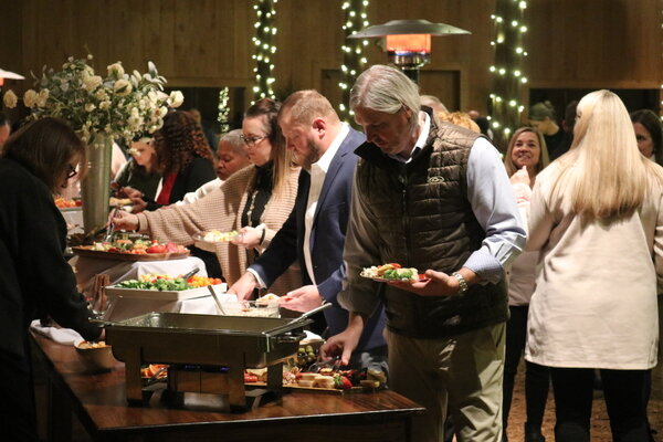 The Oak Hollow Farm in Fairhope was buzzing on Friday night as Baldwin County Education Coalition hosted their annual &quot;Evening of Education Champions&quot; event to benefit the district's future teacher program.