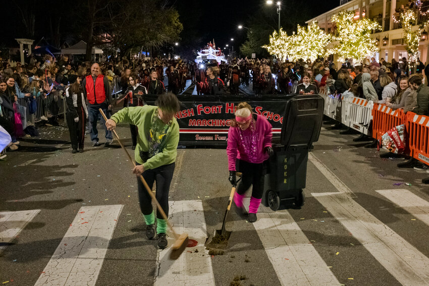 Crews start to clean up debris and lost throws in Fairhope during the Knights of Ecor Rouge parade in 2022. According to Mobile Mask, &quot;Ecor Rouge&quot; is French for &quot;Red Cliff&quot; and is a specific reference to a triangular-shaped bluff between Daphne and Fly Creek in Montrose. The organization was incorporated in 1984.