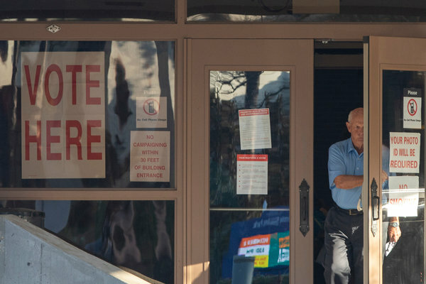 A voter exits the Erie H. Meyer Civic Center, a Gulf Shores voting precinct.