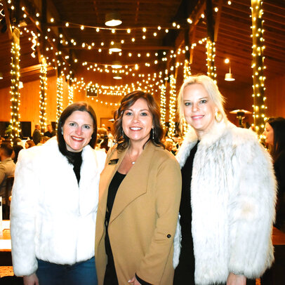Tiffany Wilson (middle) pictured at the &quot;Evening of Education Champions&quot; fundraising event in Fairhope on Jan. 19.