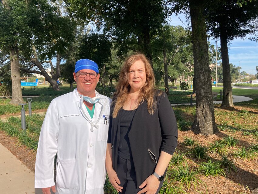 Stephanie Leigh Hall, right, was referred to Russell S. Ronson, left, a cardiothoracic surgeon at Baptist Heart &amp; Vascular Institute. Dr. Ronson listened to Stephanie&rsquo;s concerns and scheduled surgery for an ascending aortic replacement within two weeks.