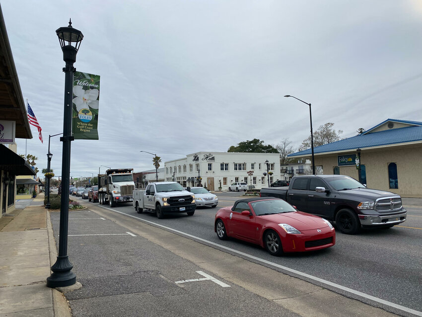 Traffic moves along Alabama 59 in downtown Foley. The city is developing a plan intended to reduce serious accidents on Foley streets in half by 2035.