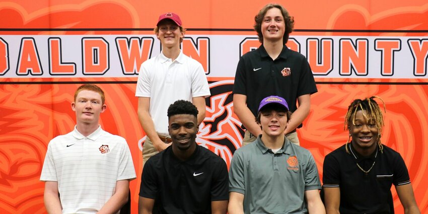Baldwin County High School had six student-athletes sign scholarships to play their respective sports at the next level on Wednesday, March 6. Pictured from the left in the front row are Austin Vilborg (Coastal Alabama-South golf), Joaquin Crook (Andrew wrestling), Alia Vickrey (Montevallo wrestling) and Nick Portis (Andrew wrestling). In the back row, from the left, are Braxton Tuttle (Coastal Alabama-North tennis) and Josh Rice (Coastal Alabama-North tennis).