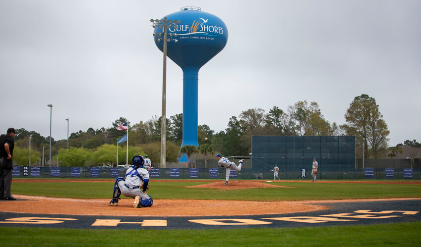 The Fairhope Pirates warm up in between innings during Thursday&rsquo;s championship game of the first Gulf Coast Classic Tournament against the Lipscomb Academy Mustangs in Gulf Shores. The first of a three-week event saw 48 softball teams and 51 baseball teams kick off their spring breaks on the Baldwin County coast.