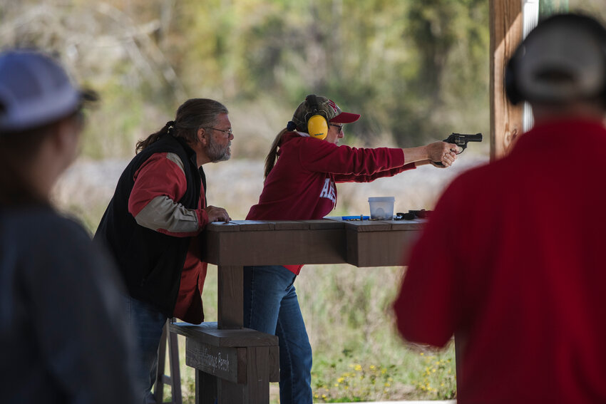 Chris Litton, retired Orange Beach logistics and safety coordinator oversees a participant in a gun safety course at the Orange Beach Police Department shooting range.