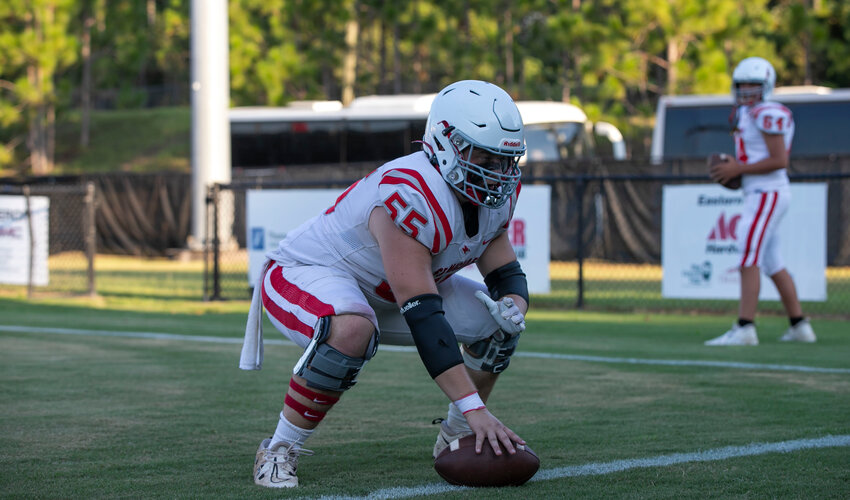 Carson Maloney warms up for the St. Michael Cardinals&rsquo; preseason jamboree on the road against the Spanish Fort Toros on Aug. 17, 2023. Although Maloney committed to the Birmingham-Southern Panthers on March 7, he&rsquo;s now looking for a new college football home after the college announced its impending closure.
